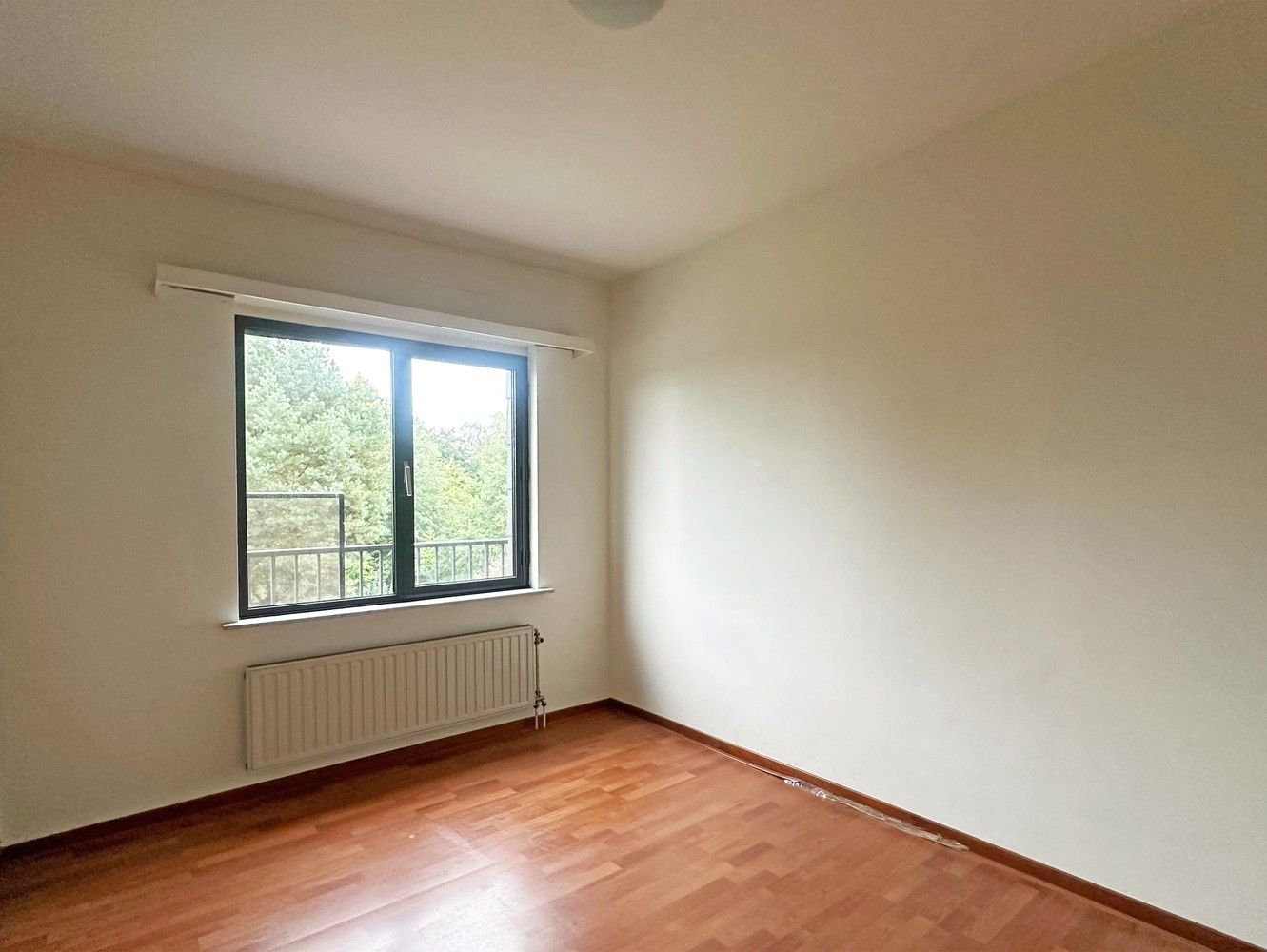 Gunstig centraal gelegen 2-slaapkamerappartement met garagebox foto 6