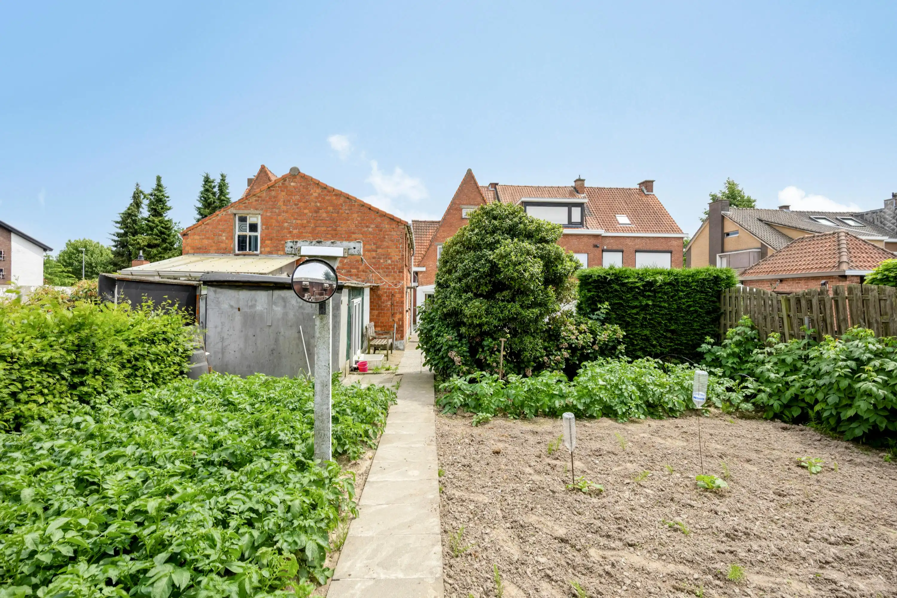 Te renoveren halfopen bebouwing met garage in Kruibeke  foto 17