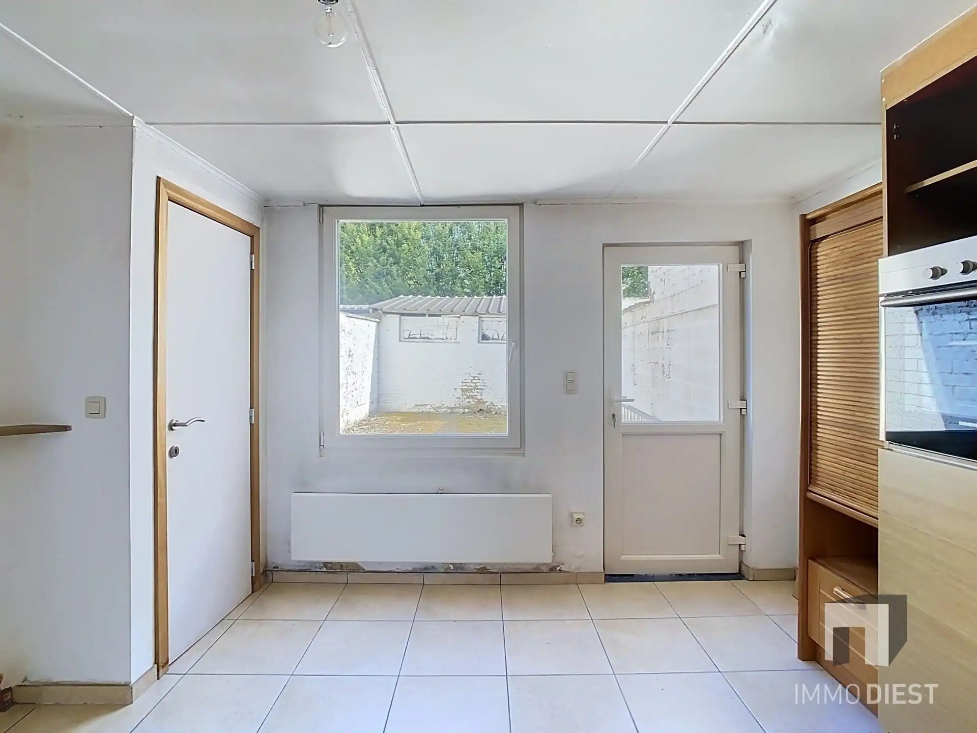 Rijwoning met 2 slaapkamers en stadstuin op gunstige locatie foto 9