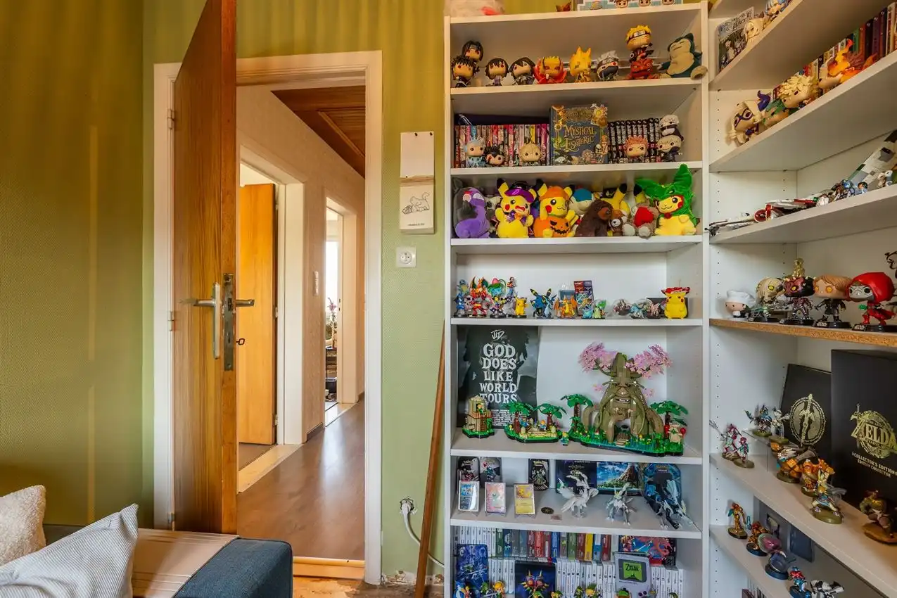 Ruime retrowoning met EPC C,  zuidtuin en achterliggende toegang. foto 17