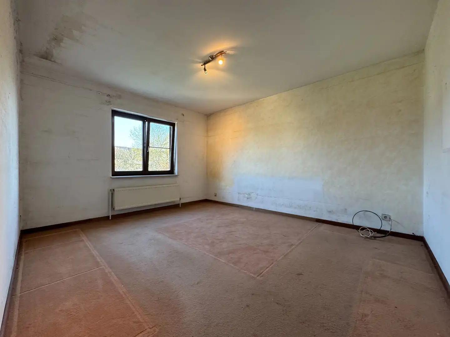 Een ruime 3-gevelwoning met tuin en garage foto 13