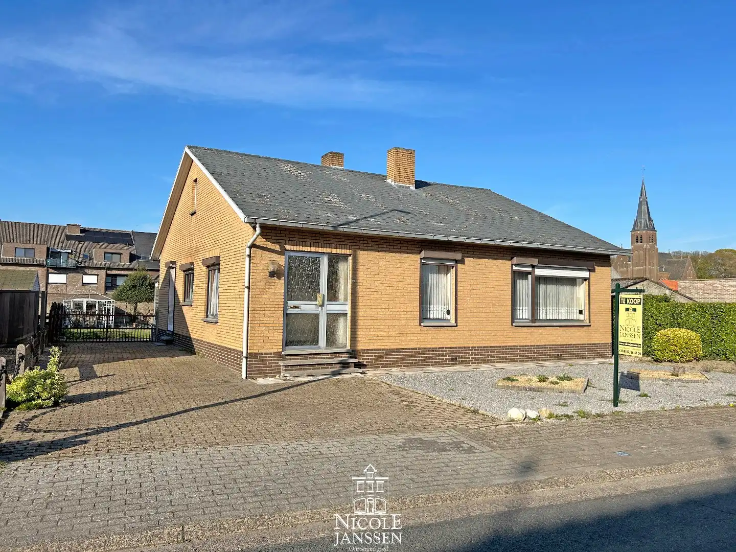 Hoofdfoto van de publicatie: Verzorgde gelijkvloerse woning met tuin in verzorgde straat in centrum van Dilsen