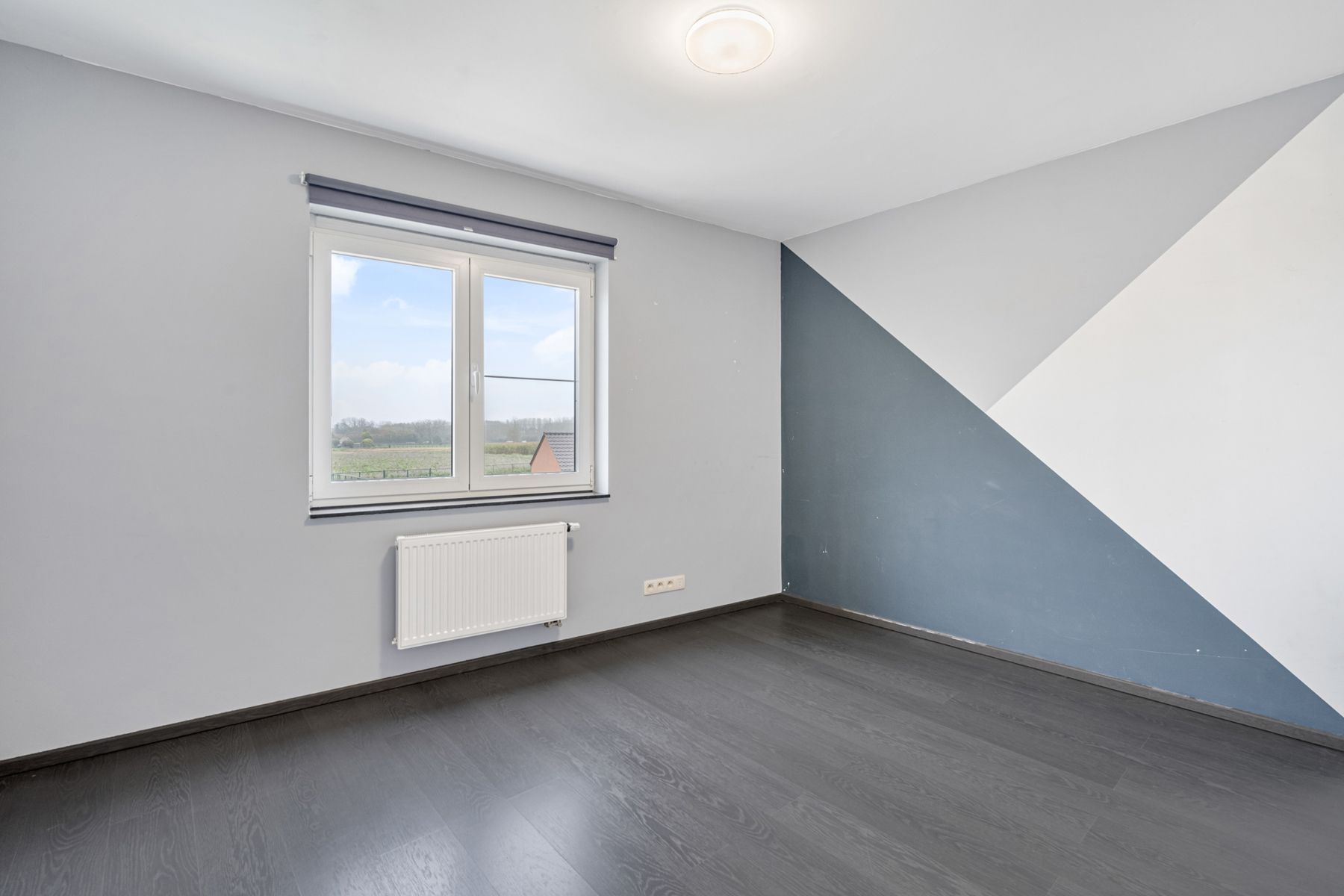 Ruim, lichtrijk appartement met autostaanplaats te Herzele! foto 9