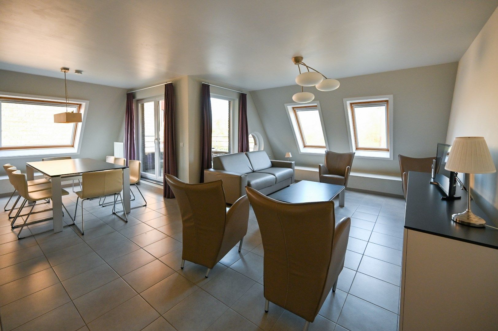 Ruim duplexappartement met 3 slaapkamers in De Haan aan zee foto 3