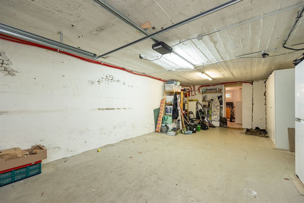 Gelijkvloers appartement met tuin en garage foto 23