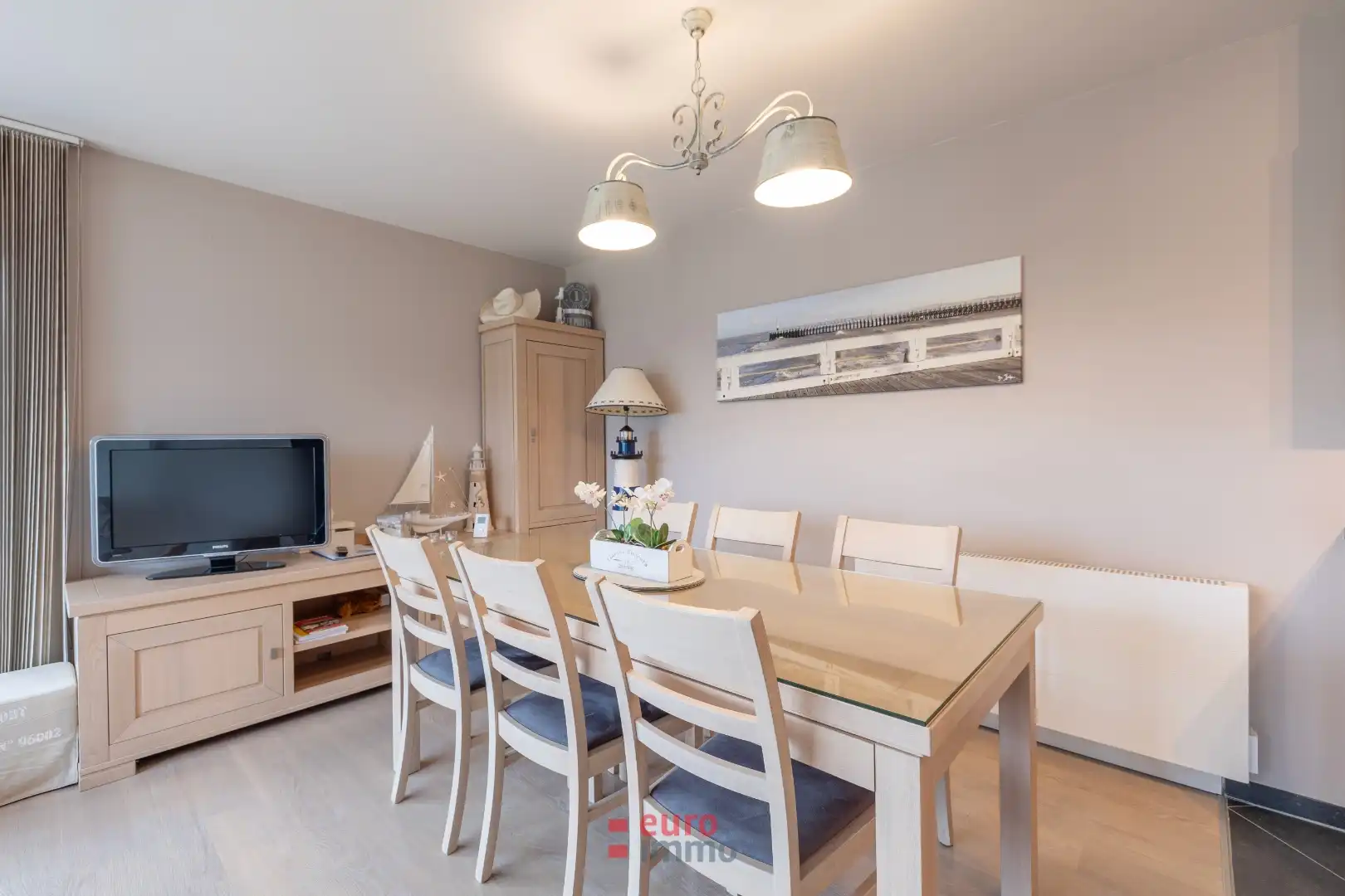 Lichtrijk hoekappartement met zonnige tuin en verwarmd buitenzwembad foto 3