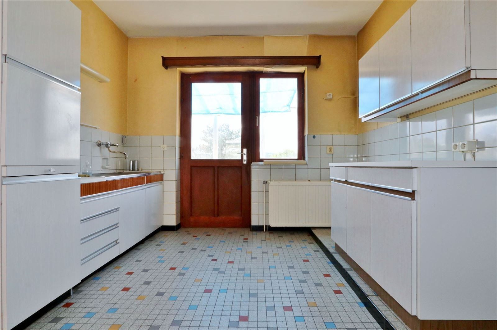 Opbrengstwoning met 2 appartementen en 3 garageboxen foto 13
