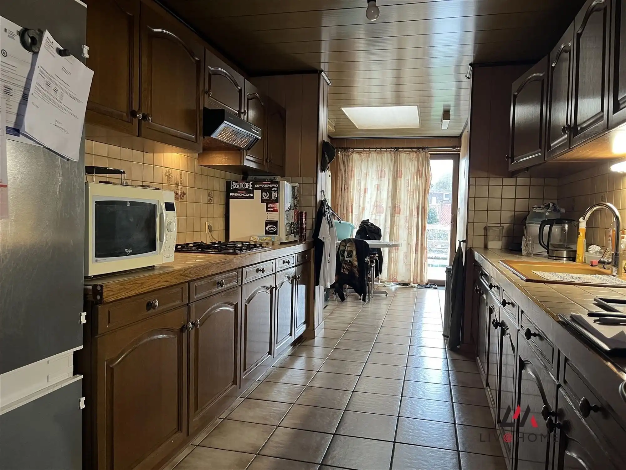 2 aangrenzende rijwoningen met gemeenschappelijke tuin foto 23