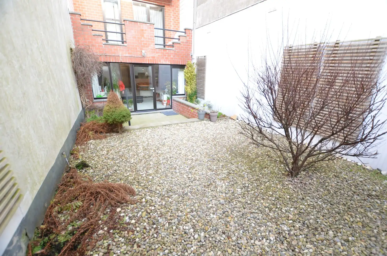 Mooie gelijkvloerse studio met tuin/terras foto 6