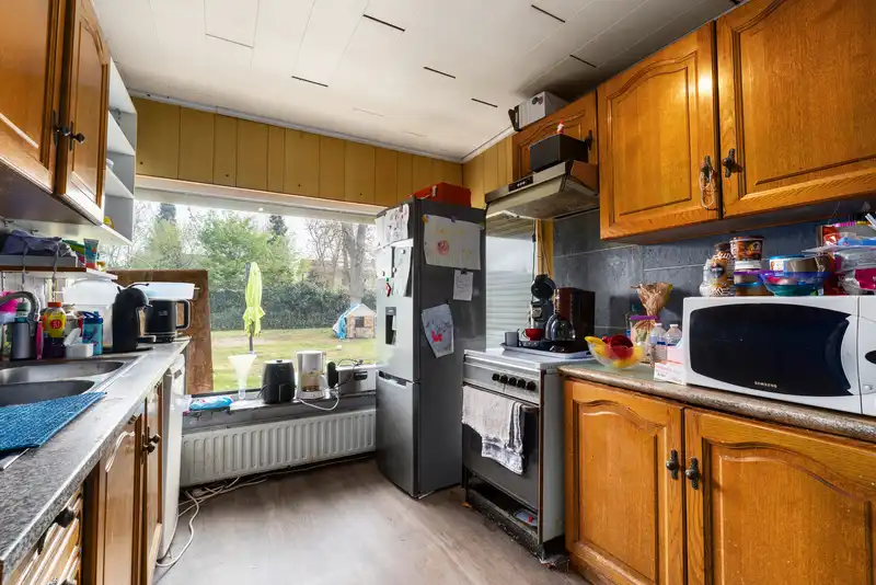 Te renoveren halfopen bebouwing met grote tuin te Zelzate foto 4