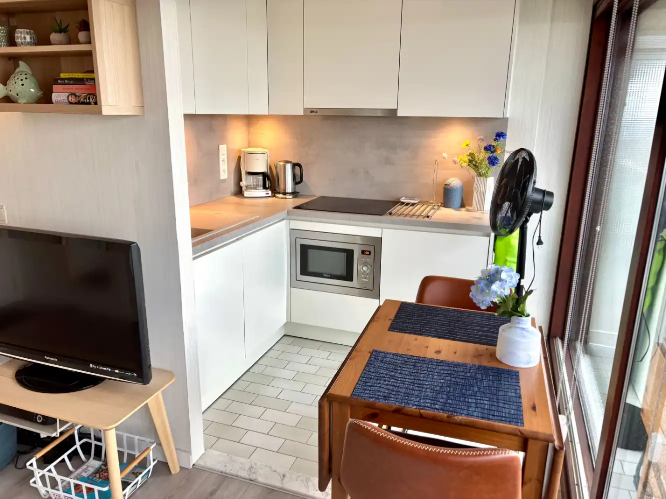 Knusse studio met fenomenaal duinenzicht foto 5