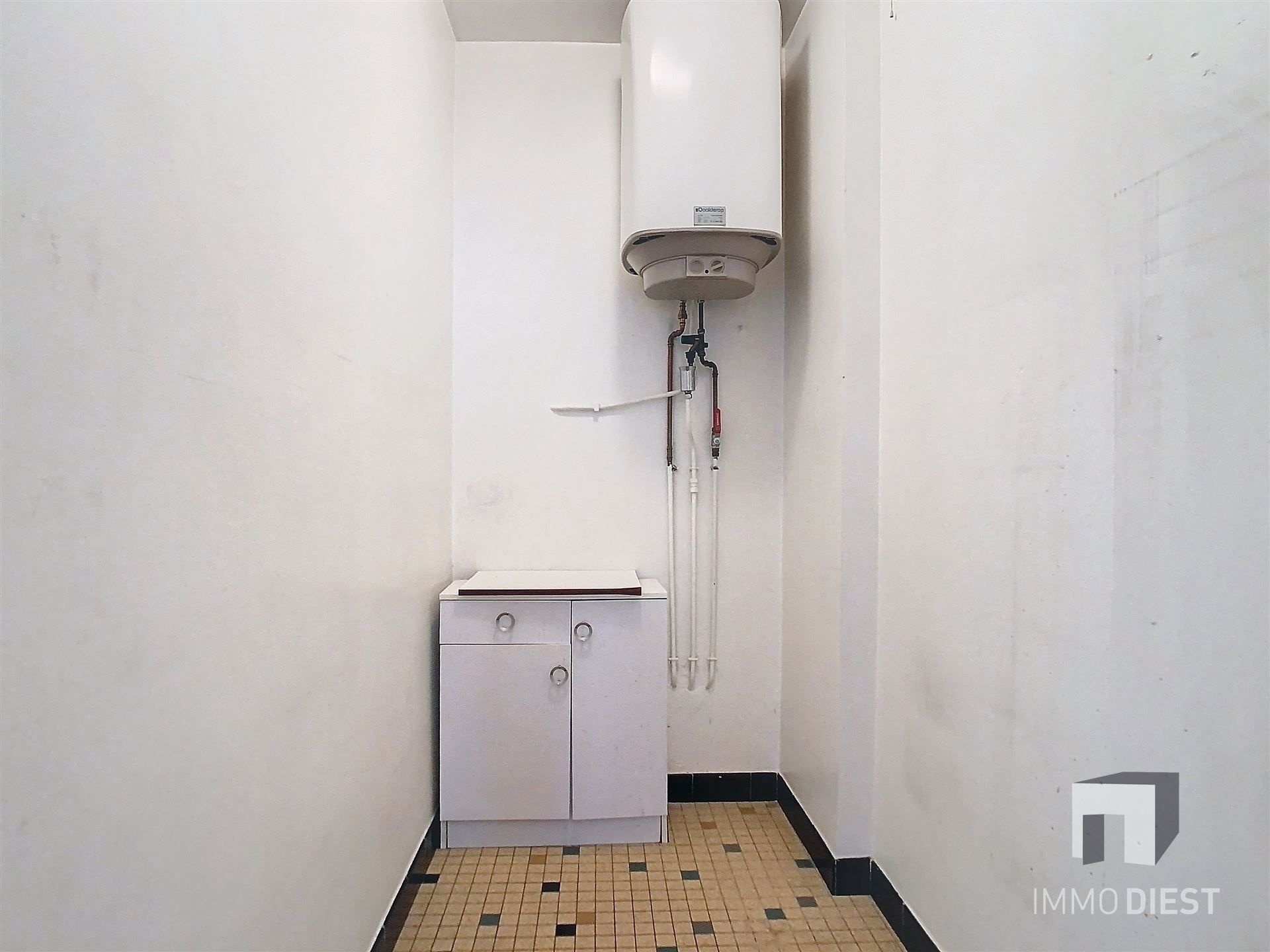 Gelijkvloers appartement met koer en 2 ruime slaapkamers foto 6