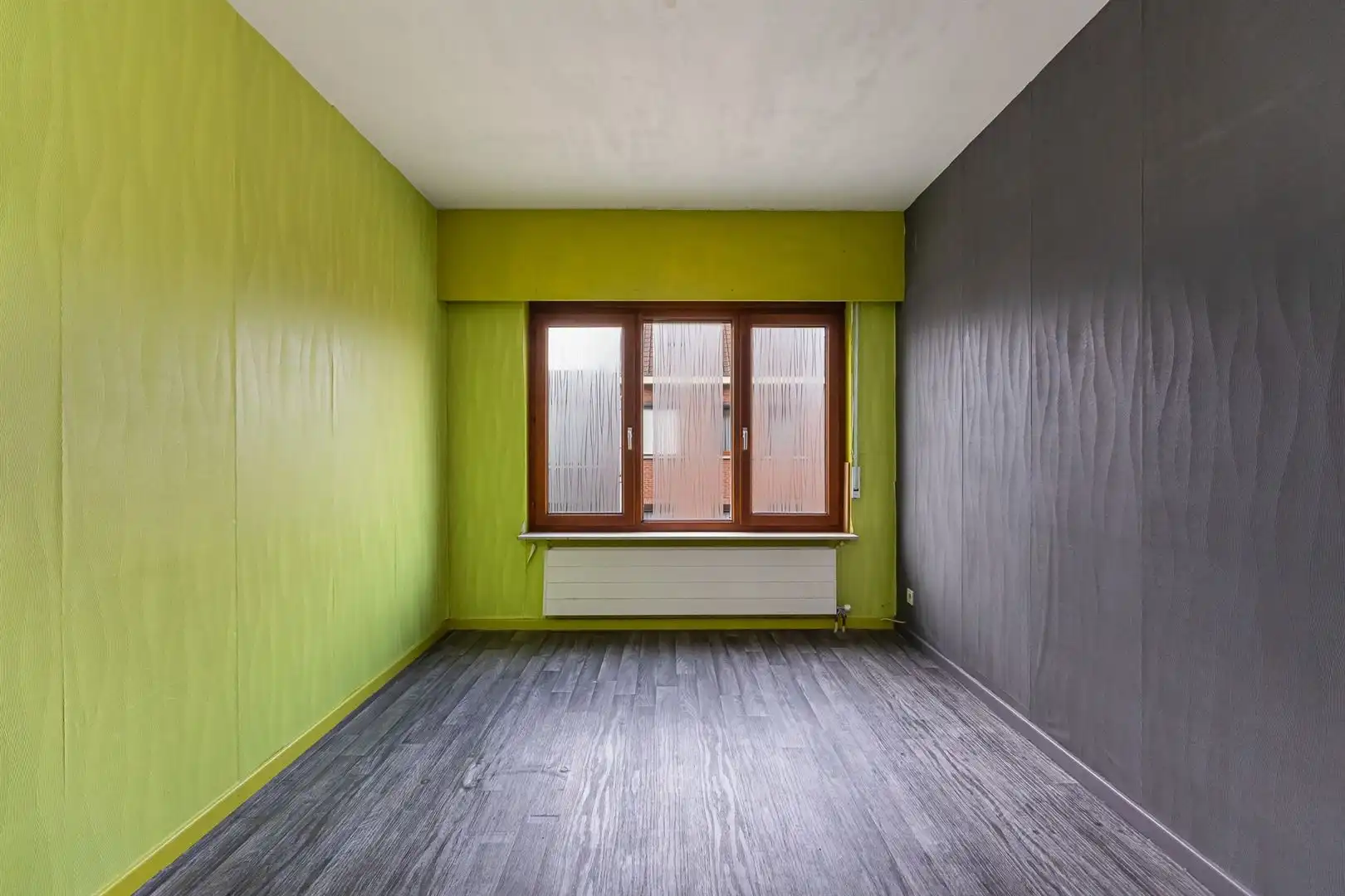 Te renoveren gezinswoning met tuin en garage in rustige centrumstraat foto 13