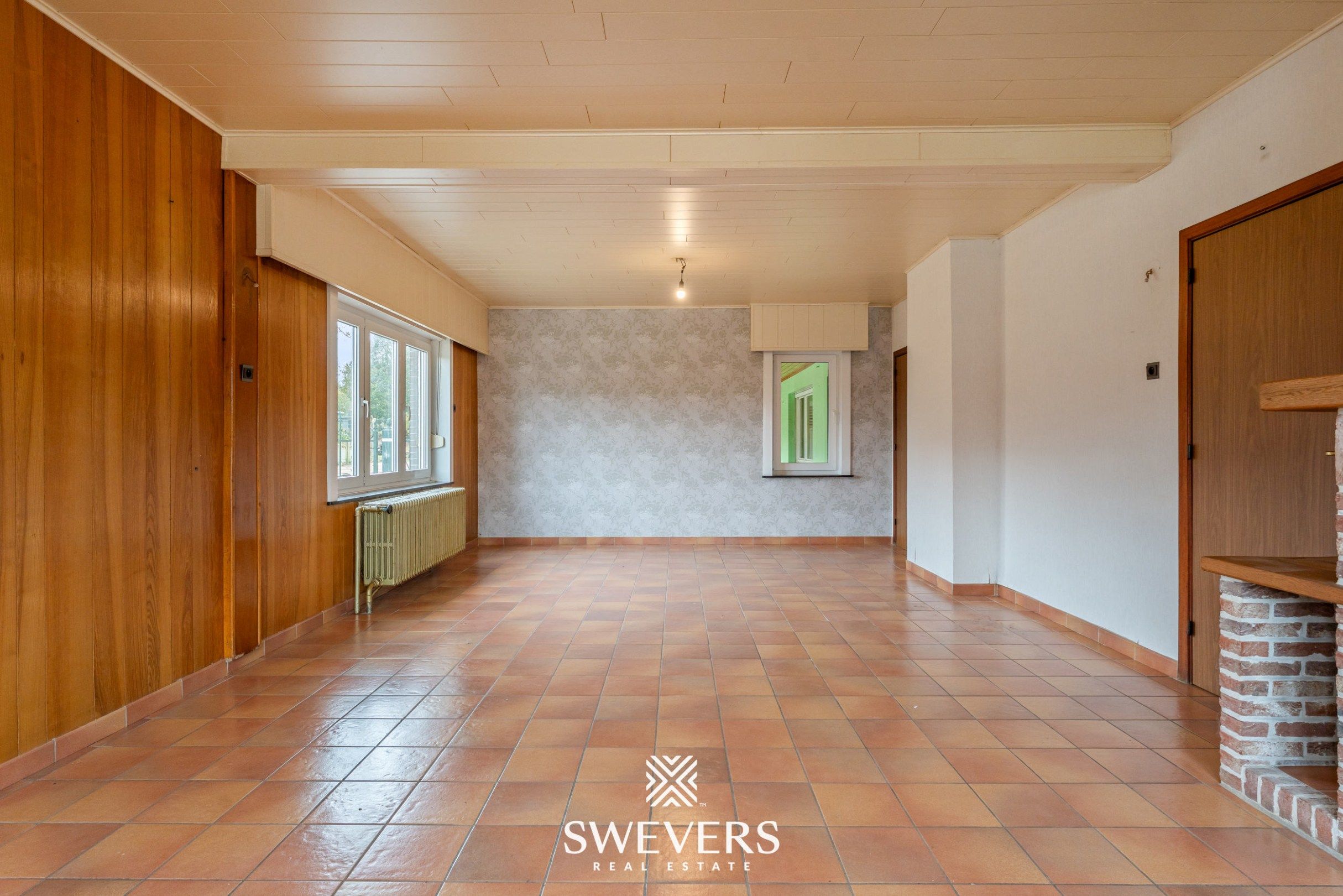 Ruime open bebouwing met potentieel en zuidgerichte tuin in rustige wijk van Houthalen foto 4