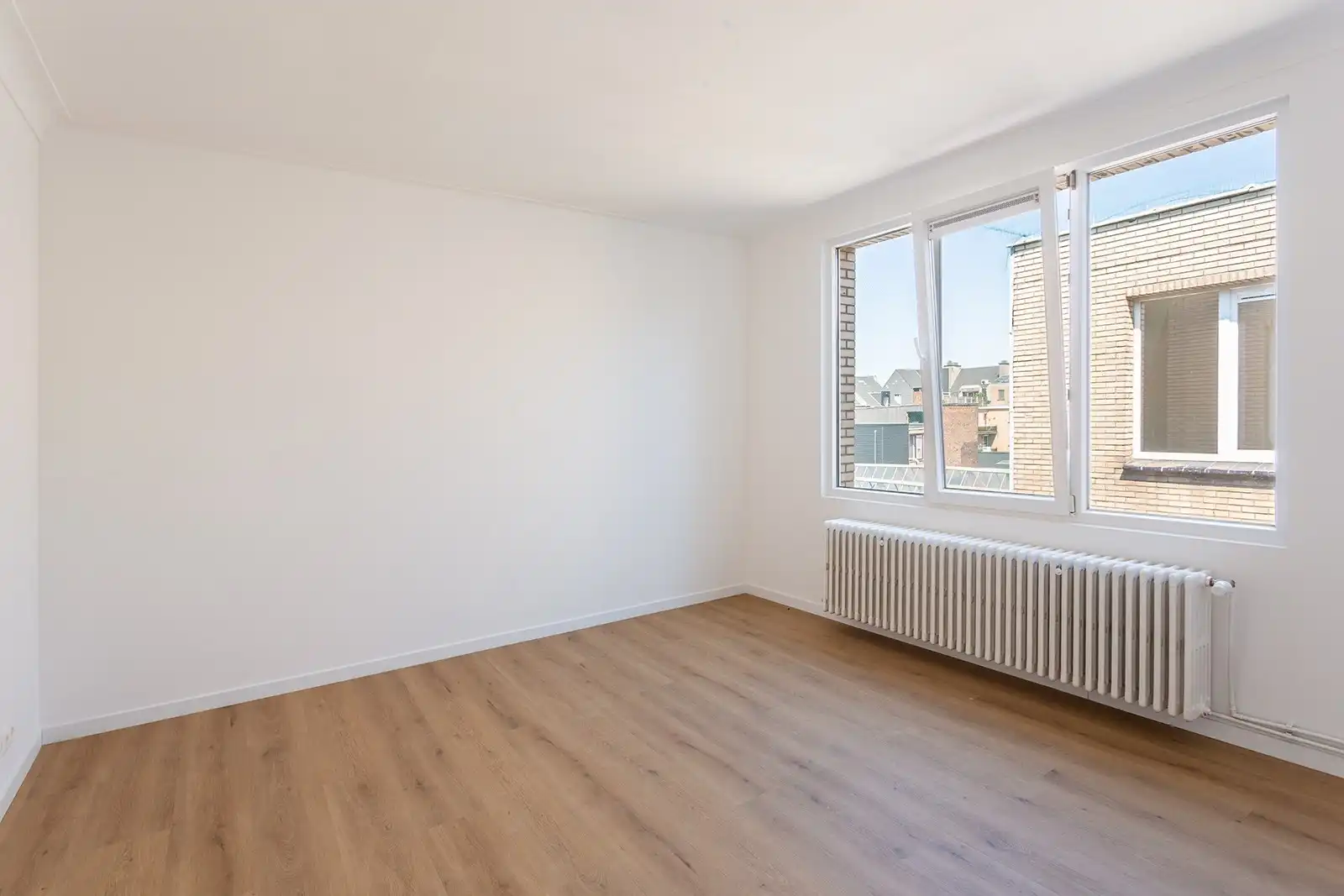 Volledig gerenoveerd opbrengsteigendom met 6 appartementen en handelsgelijkvloers foto 23
