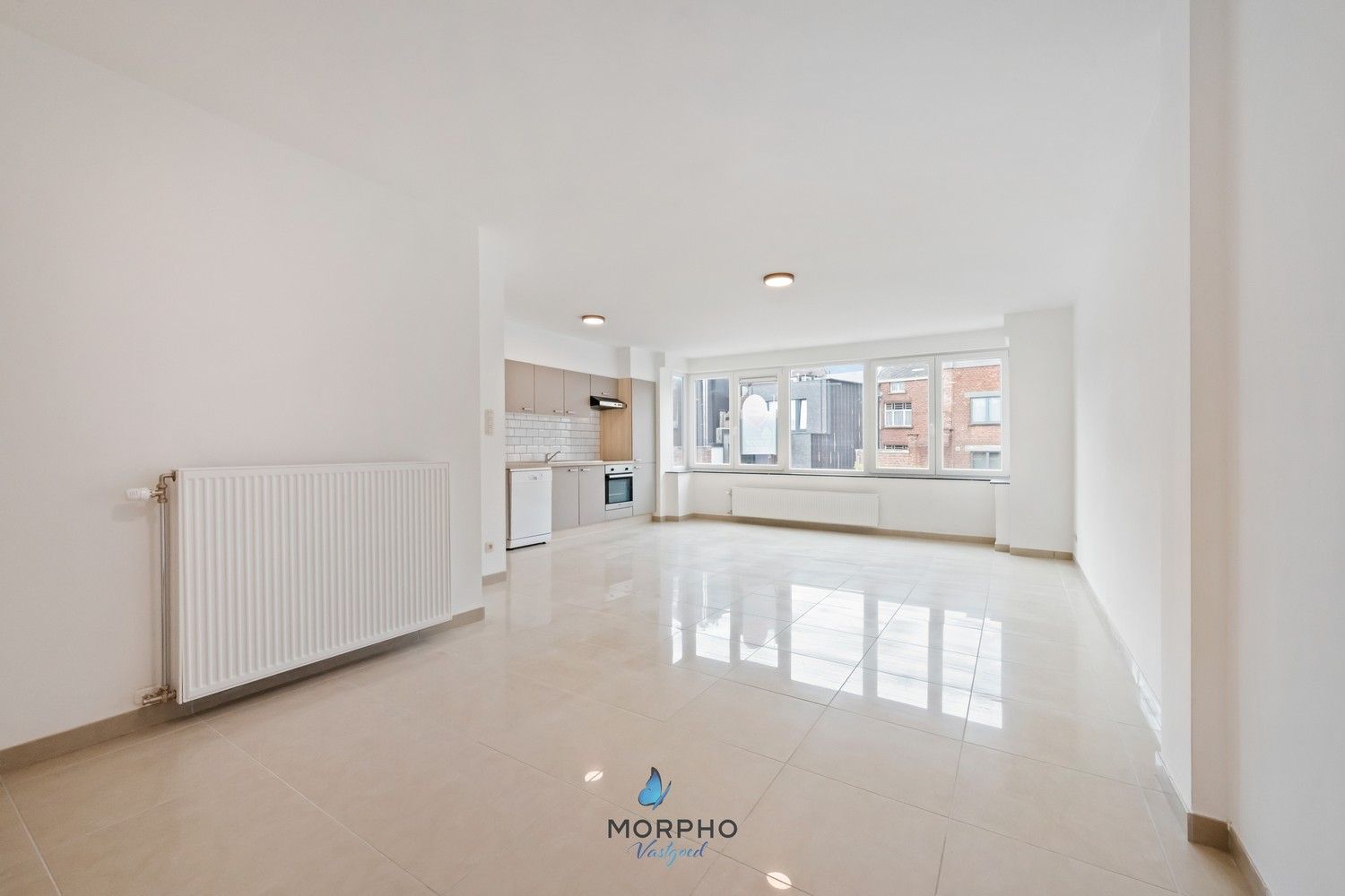 Modern en energiezuinig 2-slaapkamerappartement op de tweede verdieping in hartje Temse! foto 2