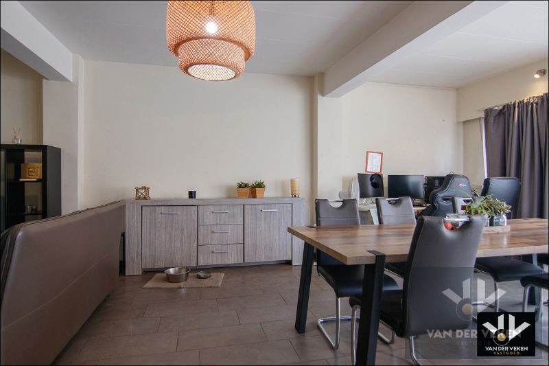 Instapklaar gelijkvloers appartement met ruime tuin te Tuilt foto 6