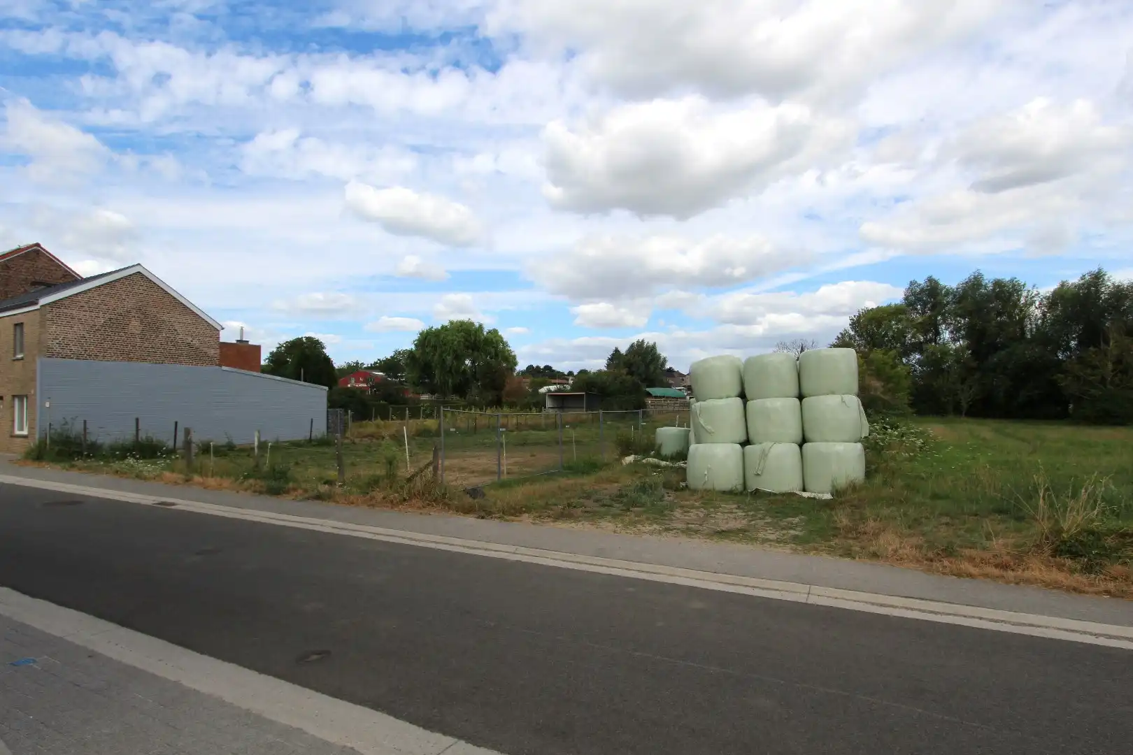 Perceel bouwgrond met diepe tuin - landelijk gelegen in Borgloon-Jesseren foto 3