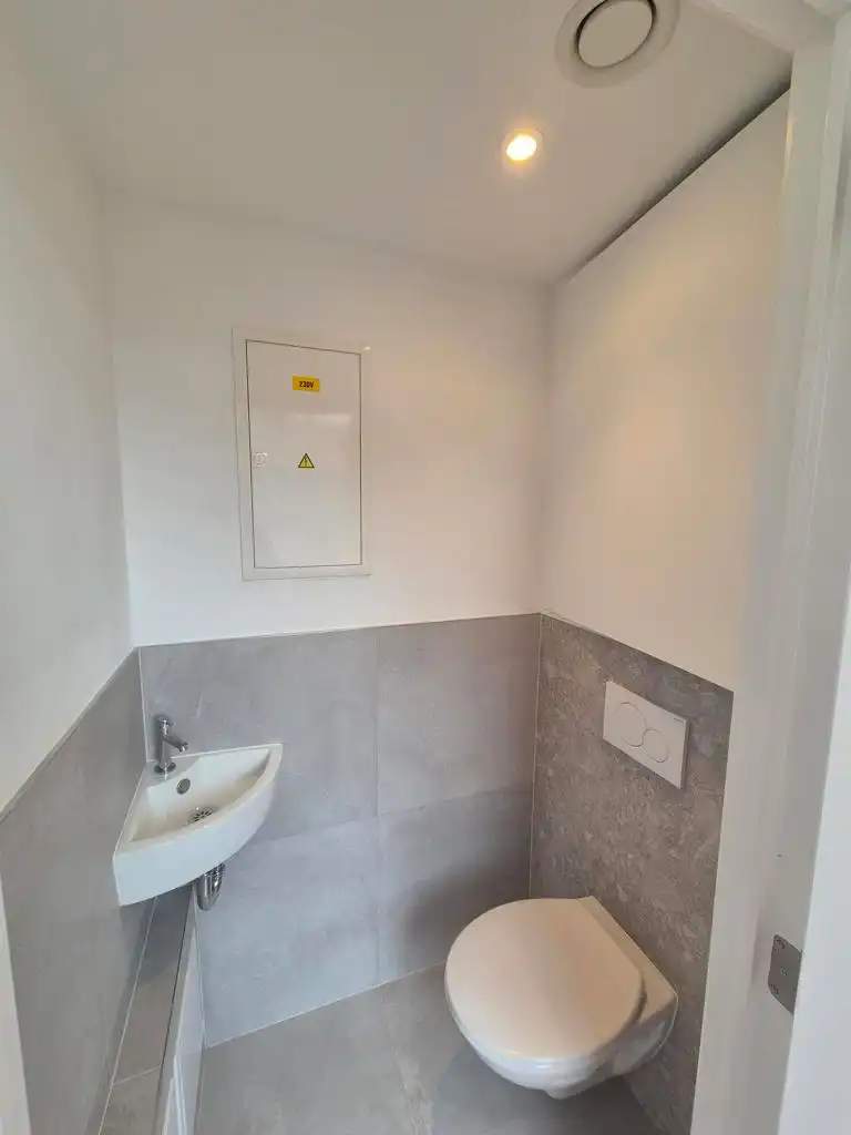 Nieuwbouw duplex met 2 slpks, bureel, terras en kelder foto 12