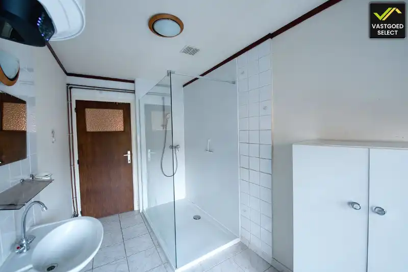 Te renoveren woning met tuin en garage in Sint-Laureins foto 11