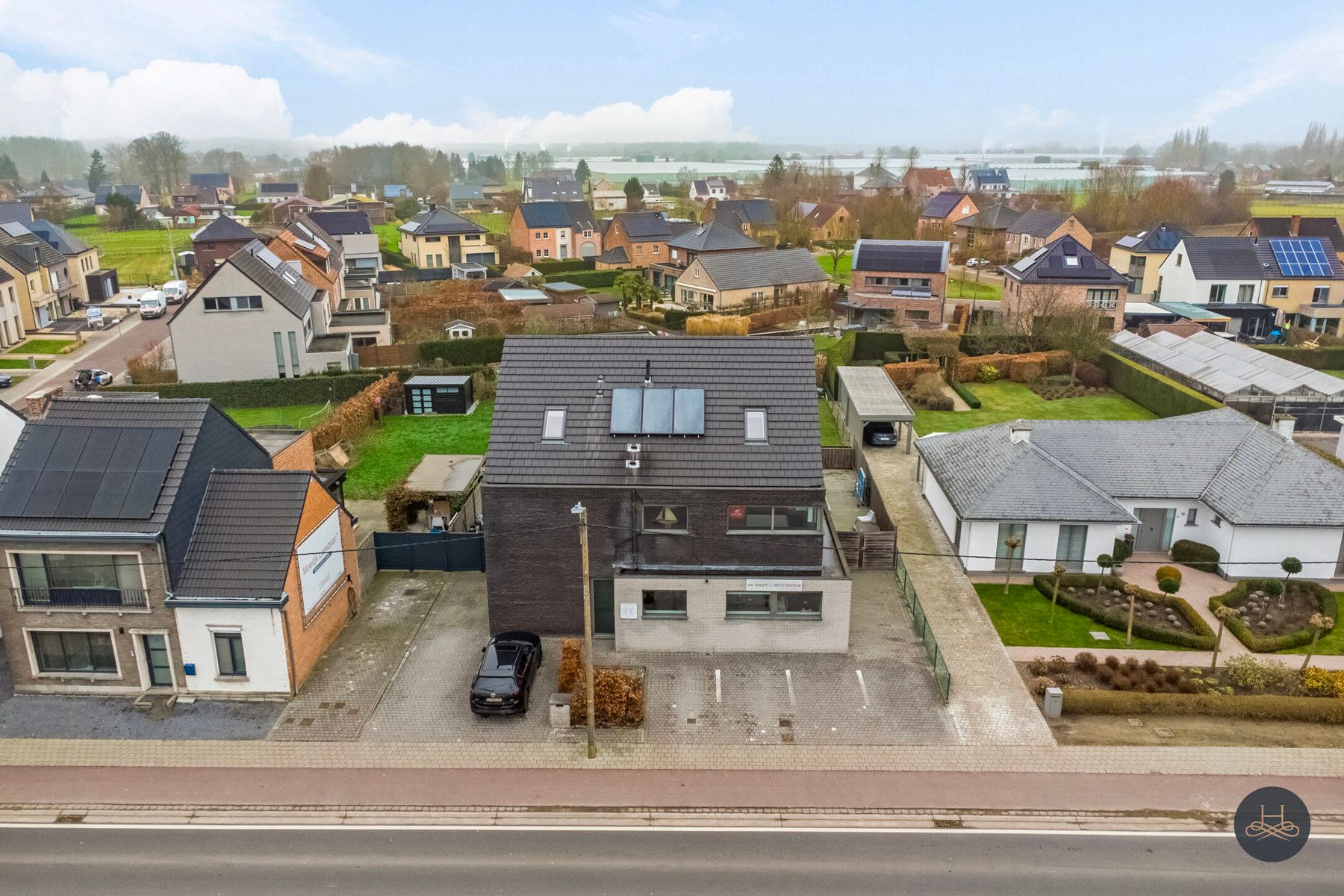 Luxueuze ruime BEN-woning met handelspand en appartement foto 3