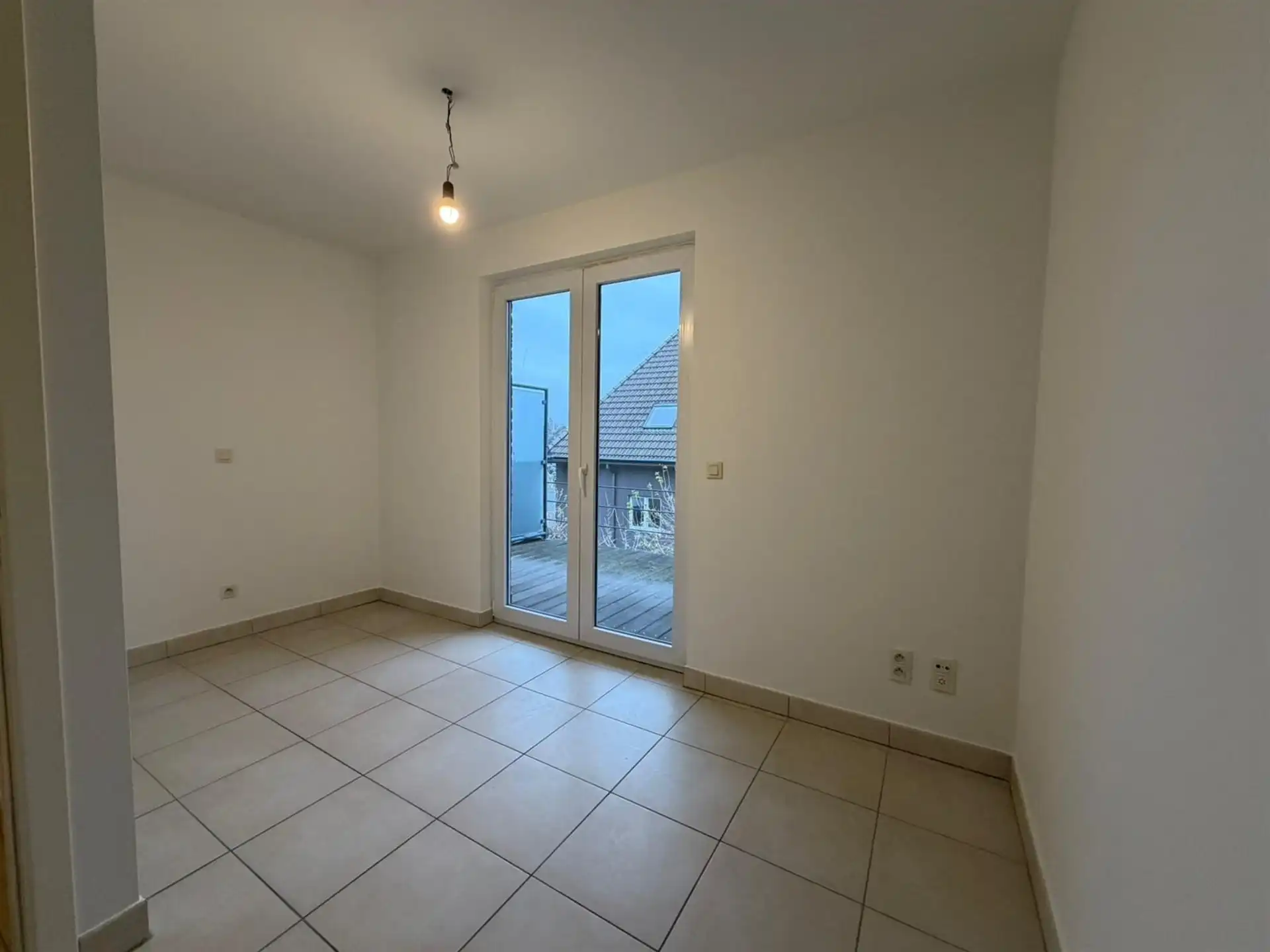 Duplex-appartement met extra zolderkamer + garagebox in het centrum! foto 11