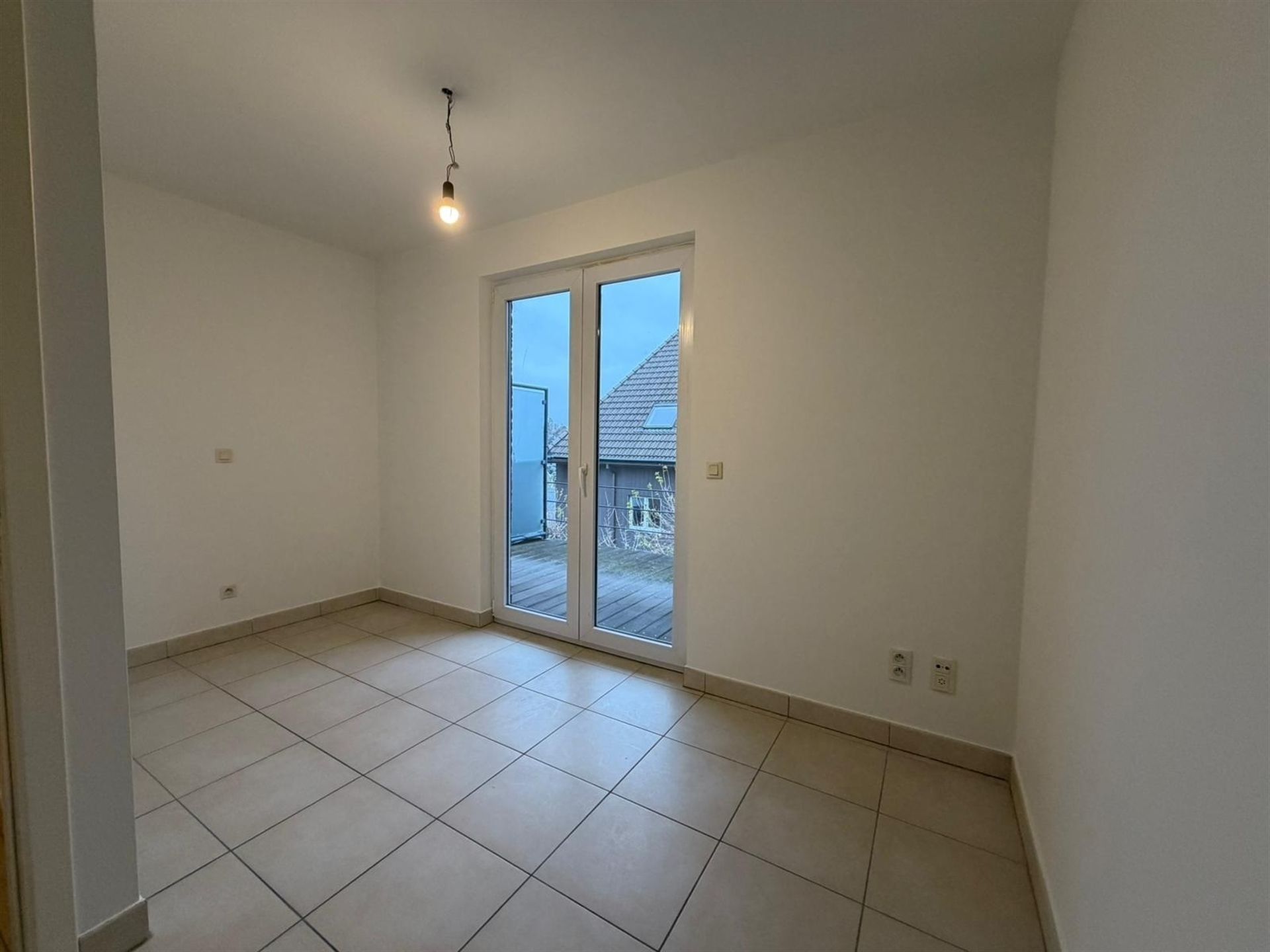 Duplex-appartement met extra zolderkamer + garagebox in het centrum! foto 11