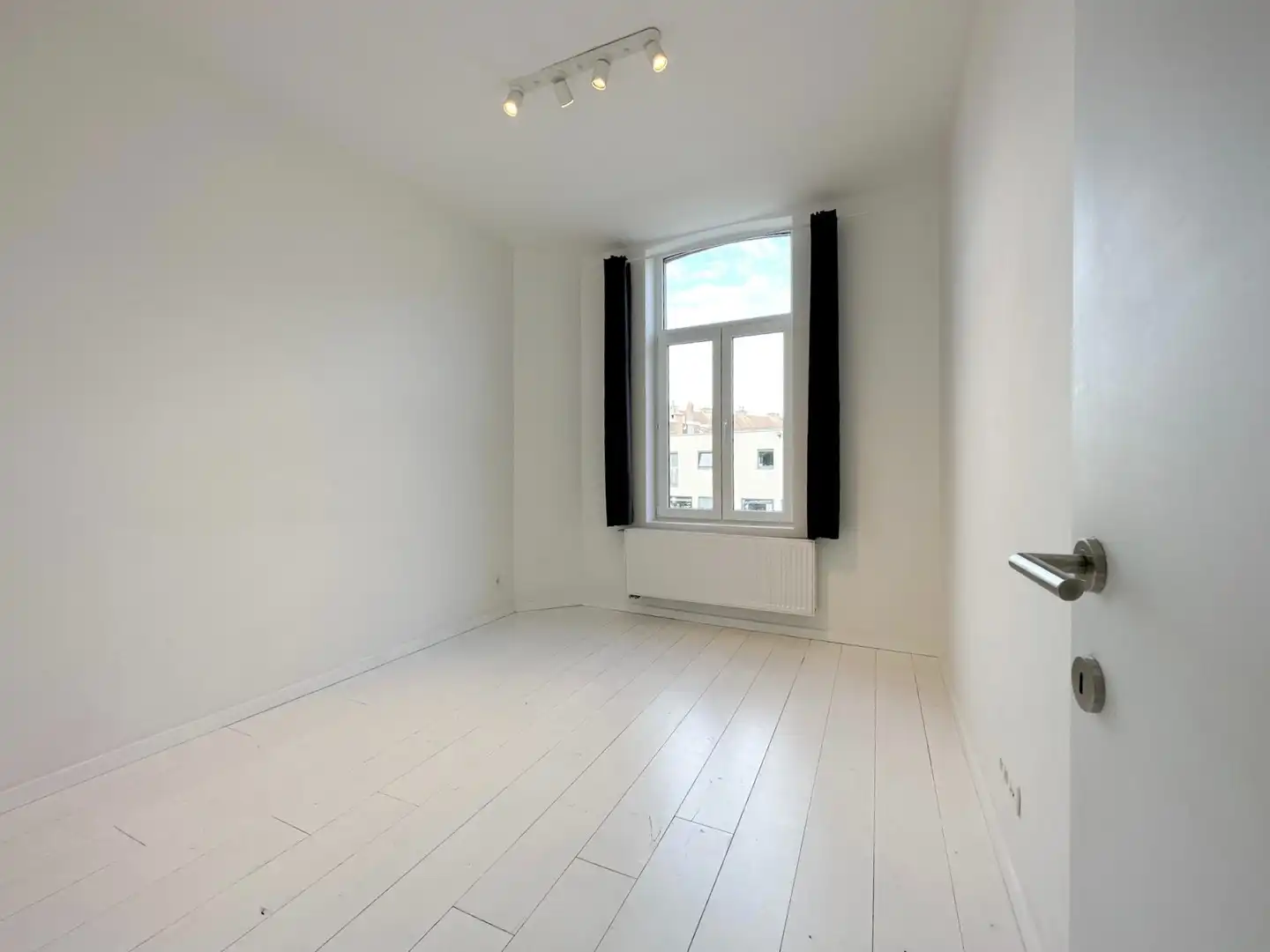 Instapklare stadswoning met 3 slaapkamers en stadskoer in Gent foto 8