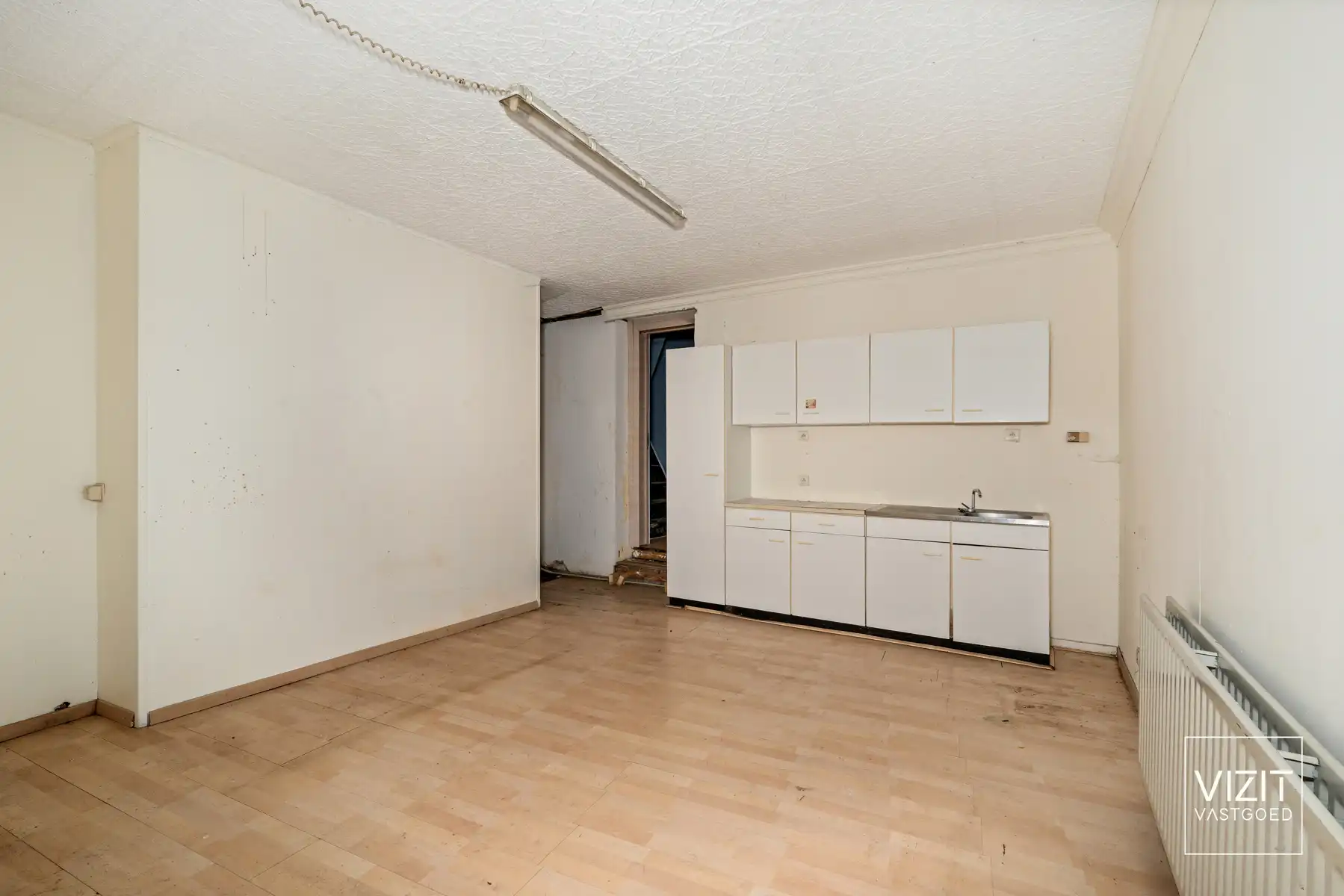 Handelshuis met woonst en ontwikkelingsmogelijkheden foto 4