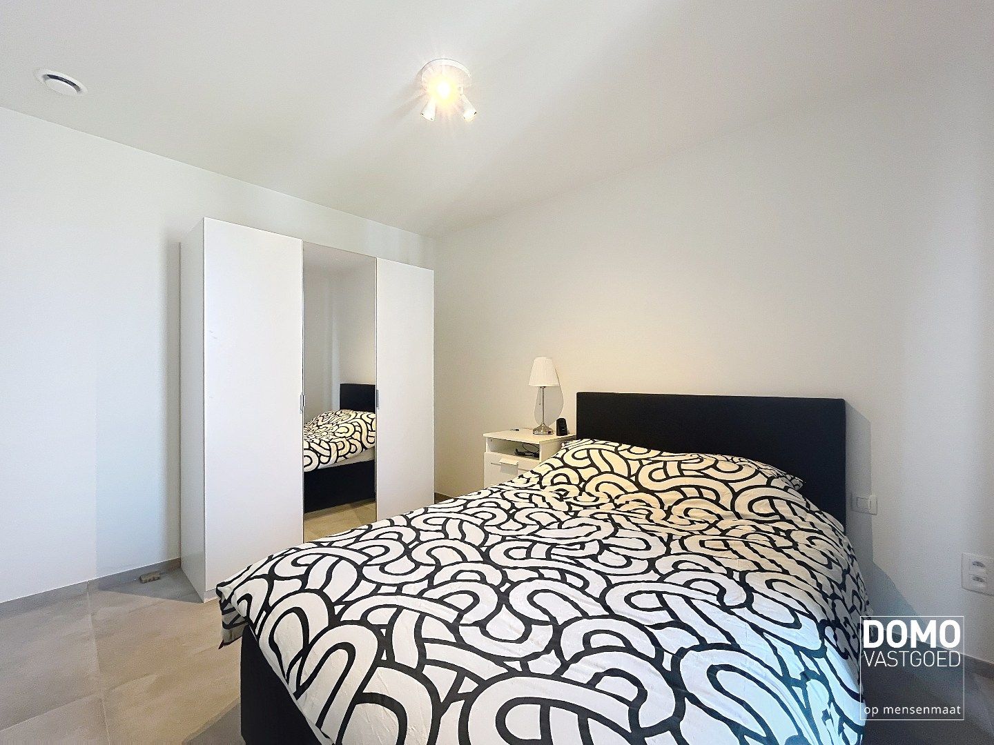 NIEUWBOUWAPPARTEMENT MET 2 SLAAPKAMERS, RUIM TERRAS, ONDERGRONDSE AUTOSTANDPLAATS EN KELDERBERGING IN MAASMECHELEN foto 9