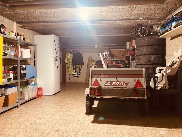 Gezellige halfopen woning met grote tuin foto 13