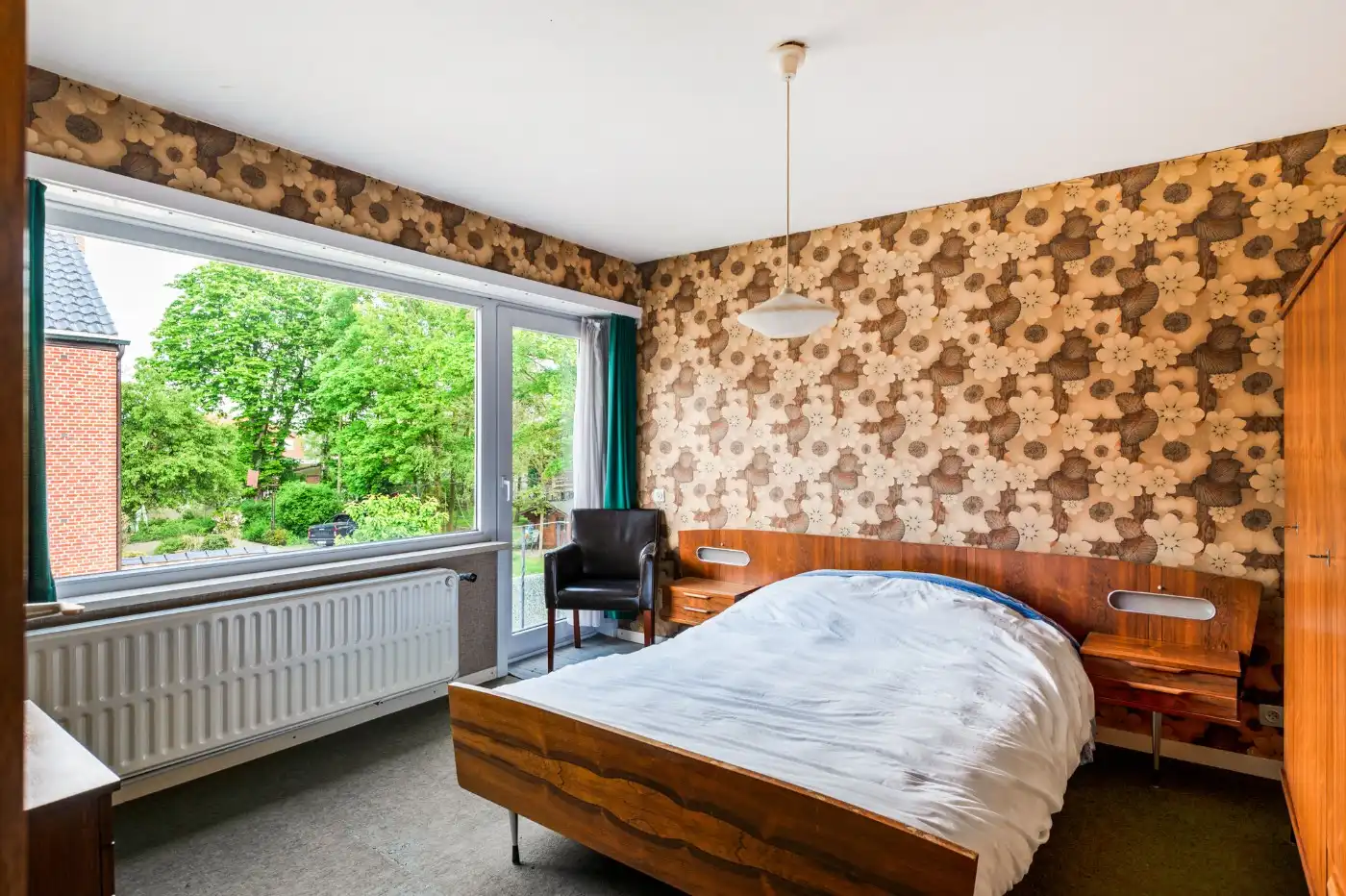 Te renoveren woning met 3 slpk., garage en tuintje foto 14