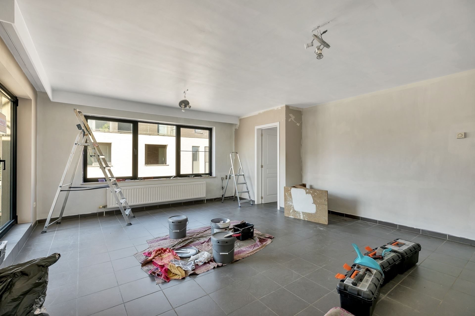 Opbrengsteigendom met 4 verhuurde appartementen en bouwgrond foto 24