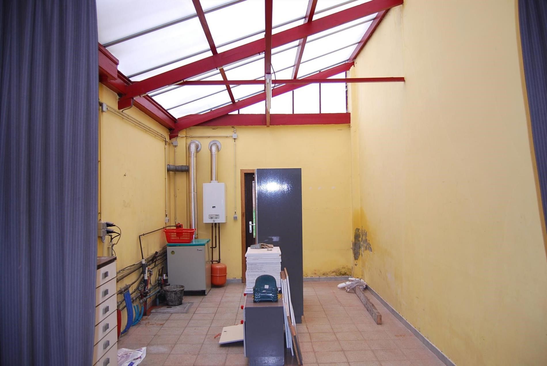 RUIME RIJWONING MET TUIN EN GARAGE foto 6
