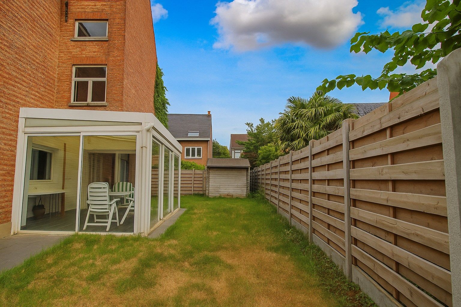Te koop: Ruime en charmante halfopen bebouwing met uitgestrekte tuin, optie tot vijf slaapkamers en veel renovatiepotentieel in het centrum van Sint-Niklaas foto 13