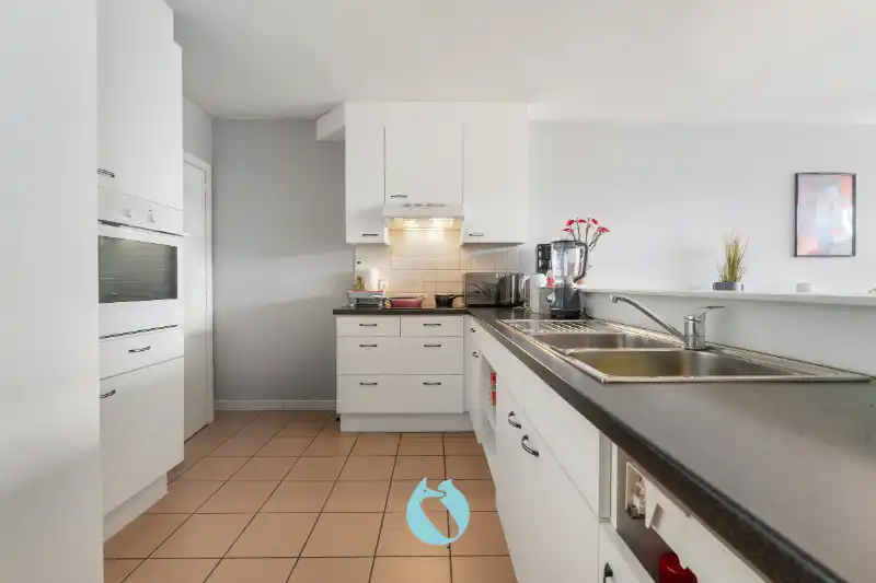 Gelijkvloers appartement met 2 slpks, tuin en garage foto 5