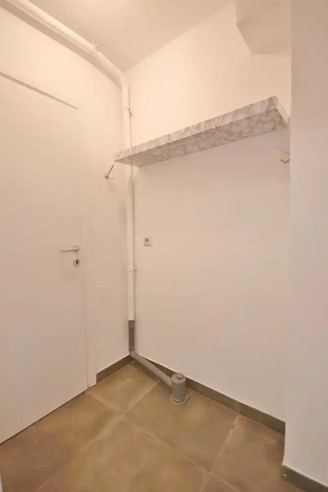 Gunstig gelegen gelijkvloers duplex appartement nabij de Grote Markt foto 9