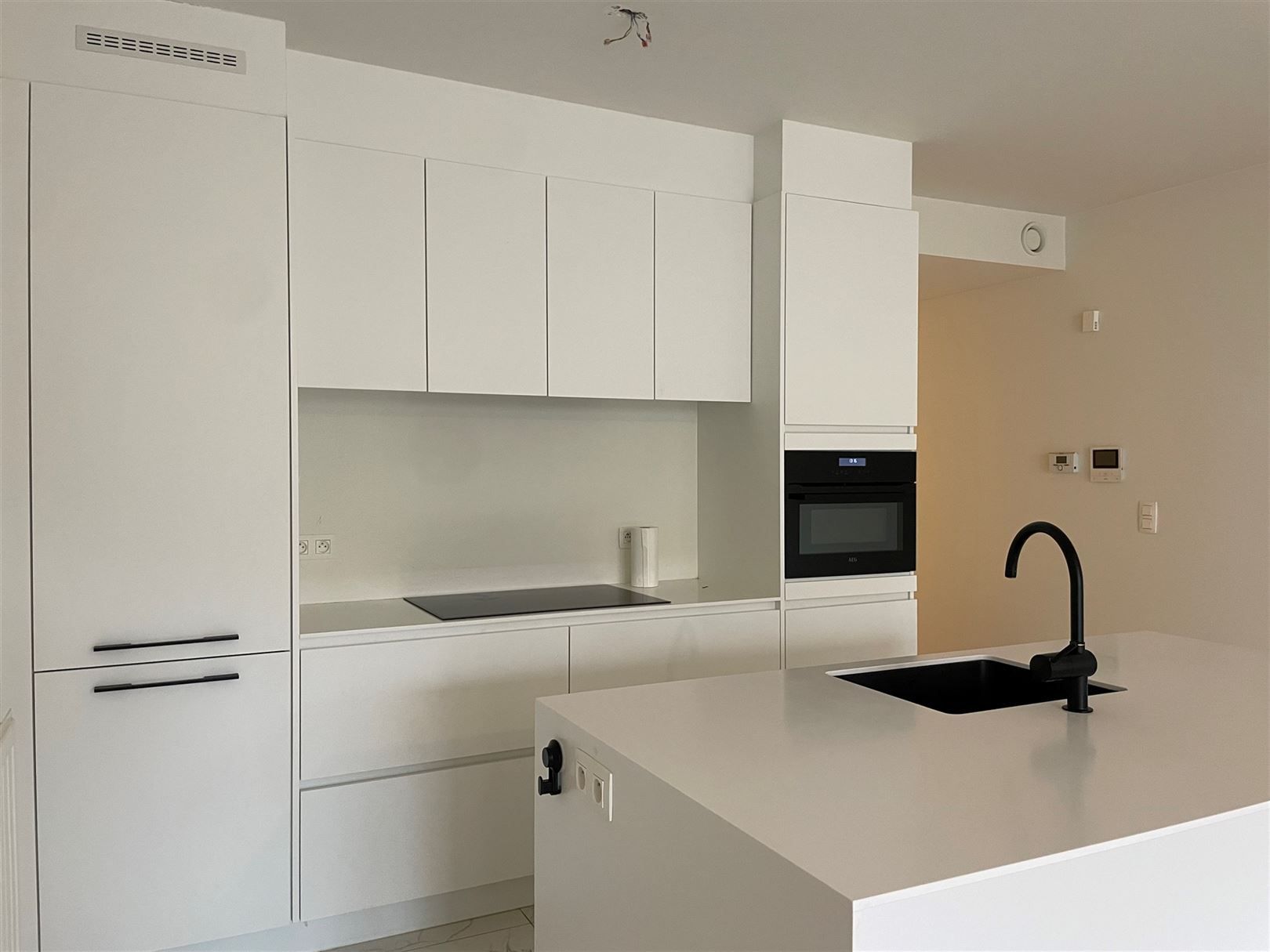 Gelijkvloers appartement met zonnig tuintje. foto 4