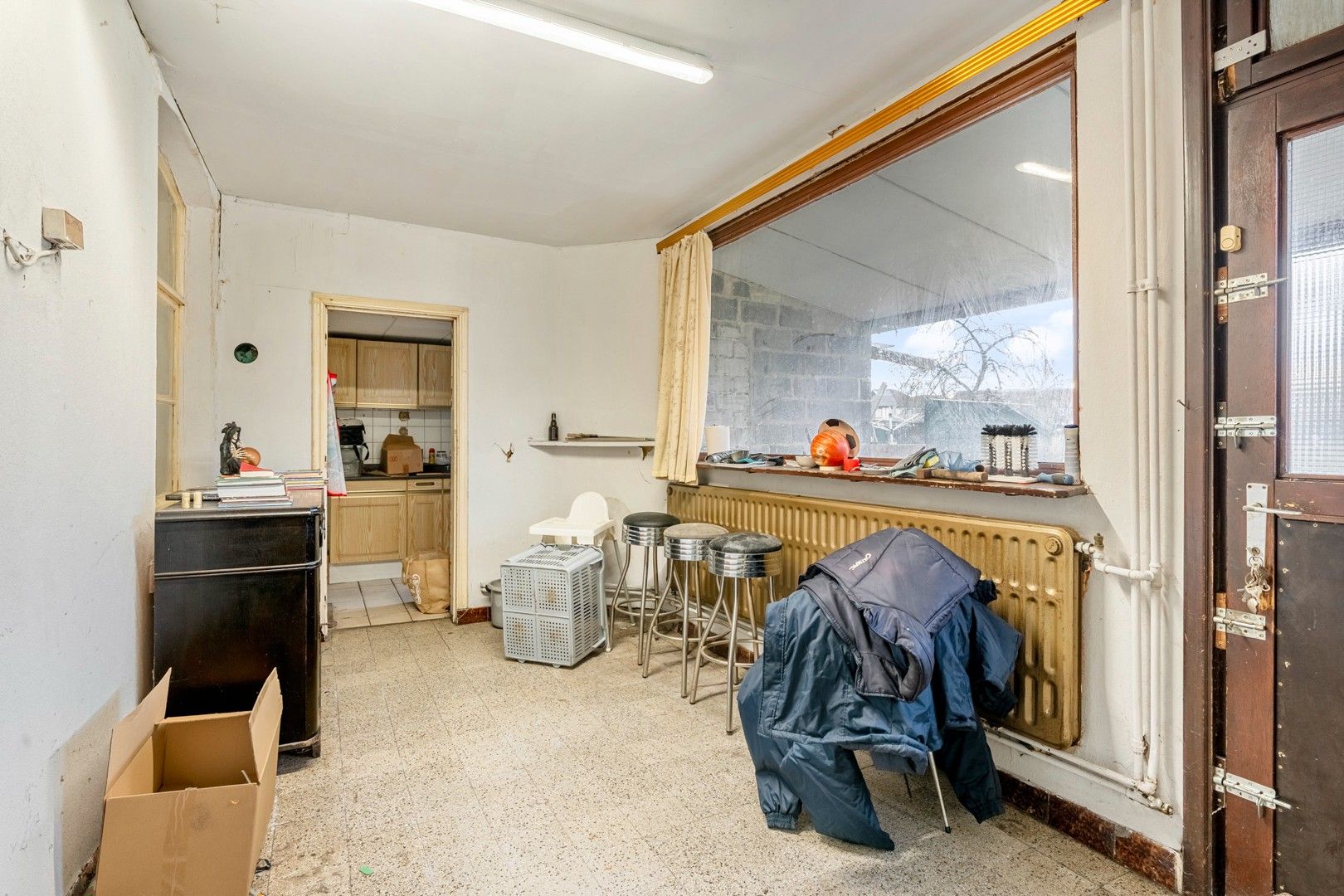 Woning met uitzonderlijk potentieel voor totale renovatie in Genk foto 4