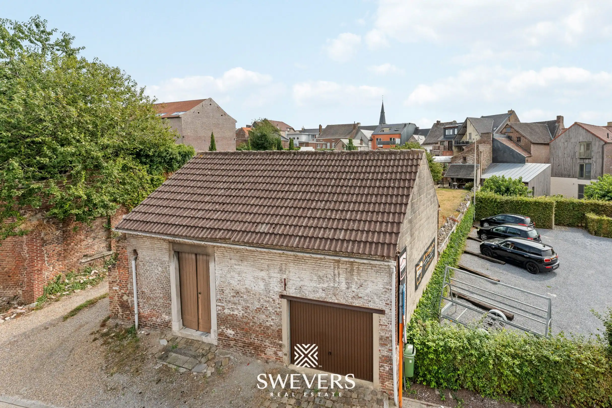 Karaktervol herenhuis met 346 m² woonruimte en uitzonderlijk renovatiepotentieel in centrum Borgloon foto 40