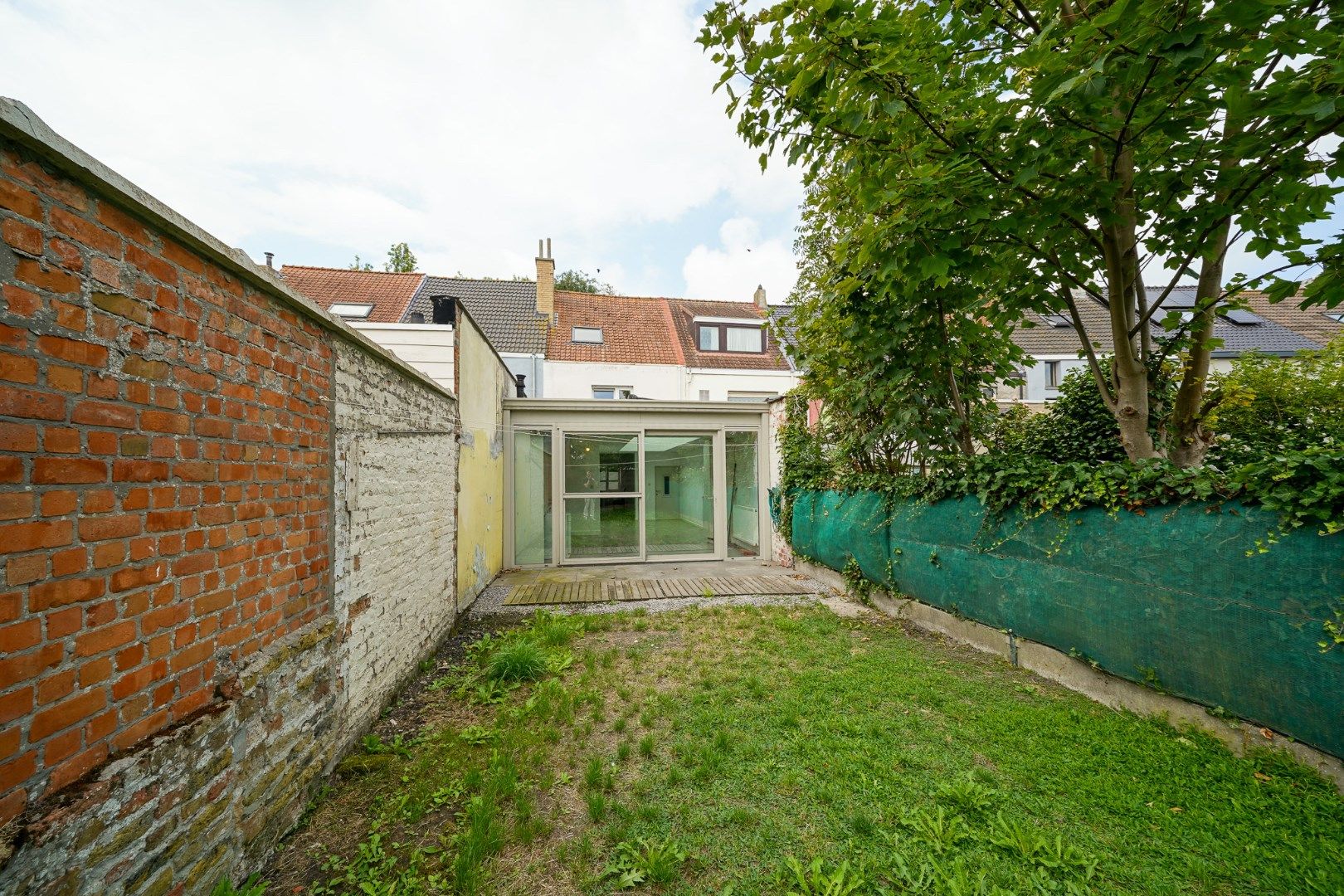 Rijwoning met 3 slaapkamers en tuin nabij de Spuikom foto 8