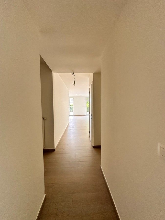 Mooi gelijkvloersappartement met 2 slpk en parking foto 15