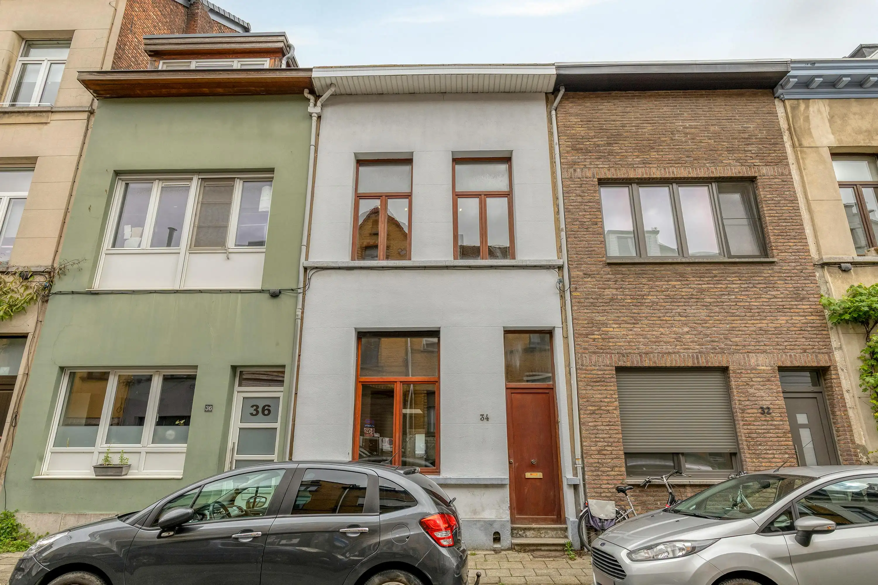 Op te frissen huis met 4 slaapkamers te koop in Borgerhout! foto 26