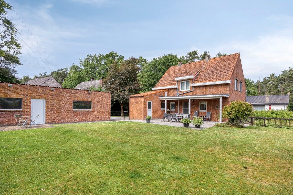 Rustig gelegen woning met oa 4 slpks op een mooi breed perceel van 21 are. foto 32