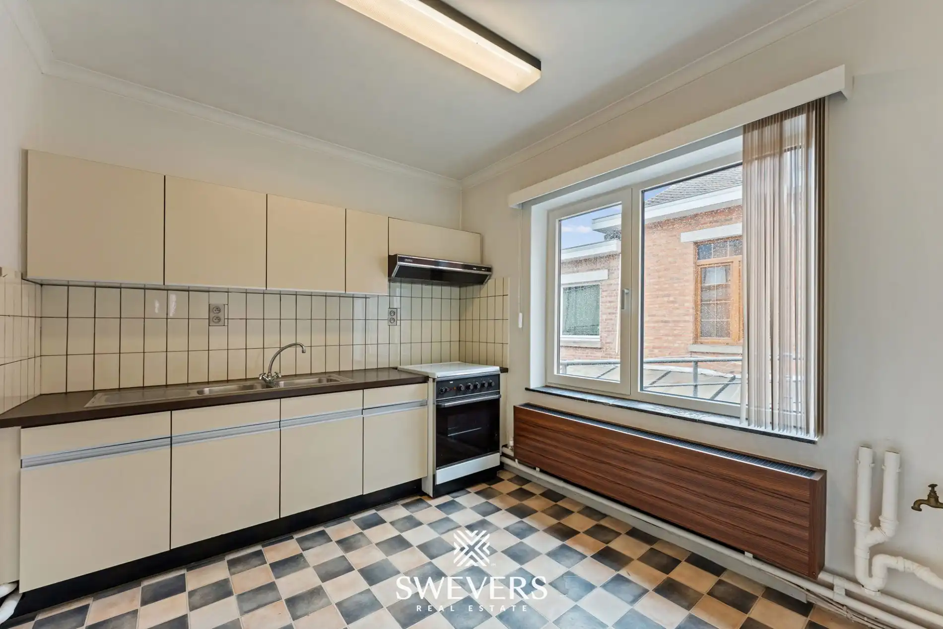 Authentiek pand (°1850) ruim duplex appartement met handelsruimte foto 17