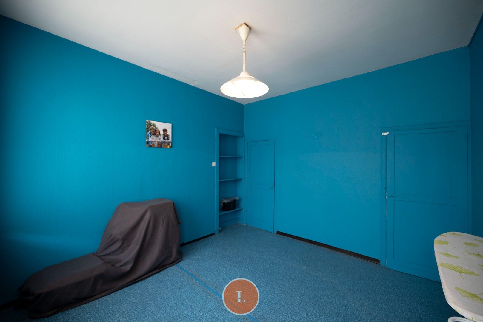Te renoveren woning te koop in centrum Menen foto 11