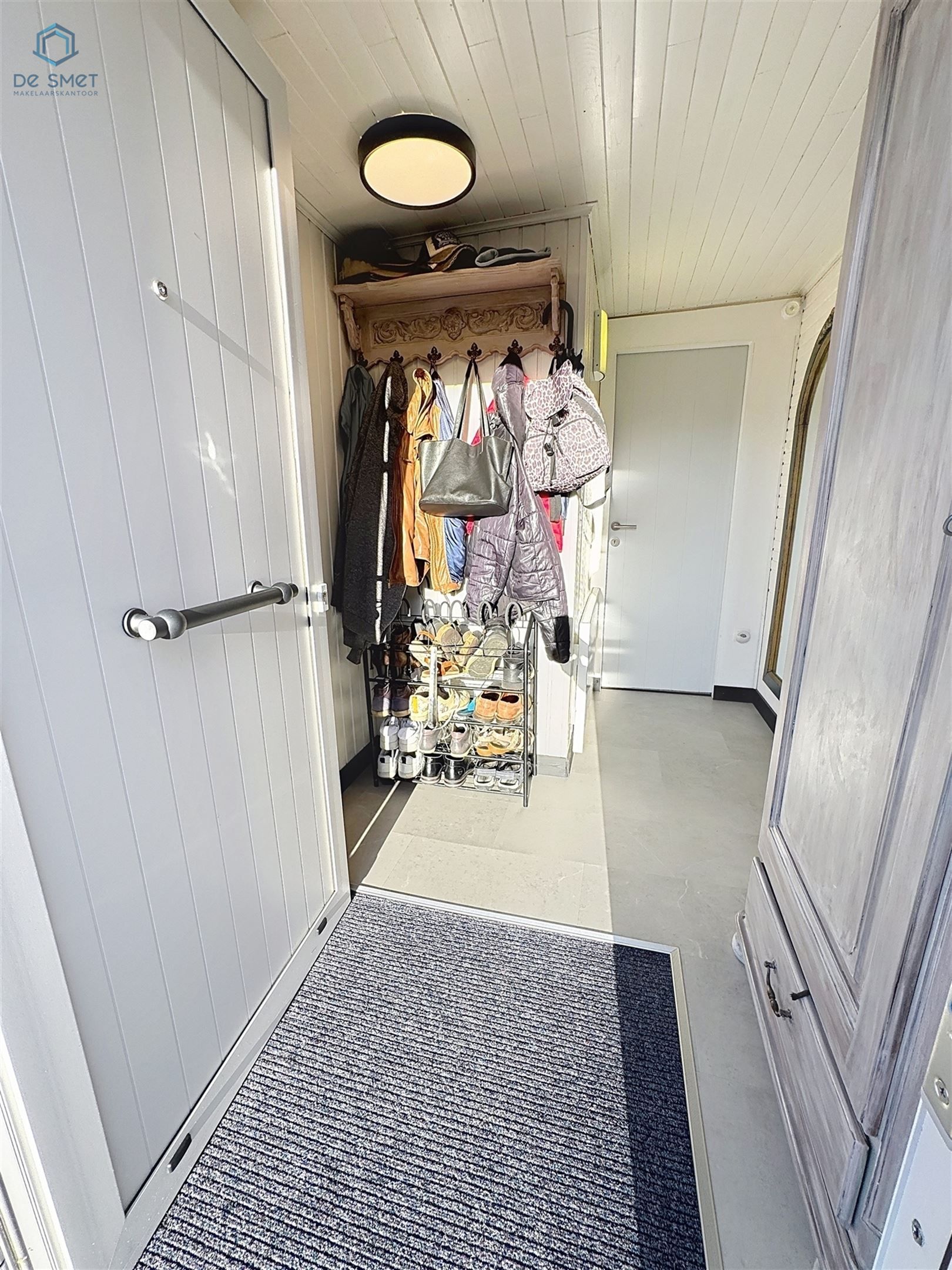 Instapklare woning met 3 slaapkamers, stadstuintje, berging en carport in rustige straat nabij centrum Brakel foto 2