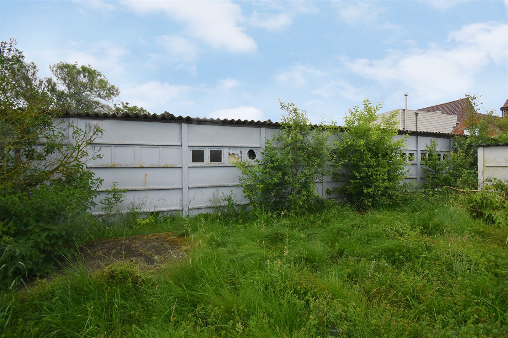 Woning met hangaar en leuke tuin! Te renoveren.  foto 19