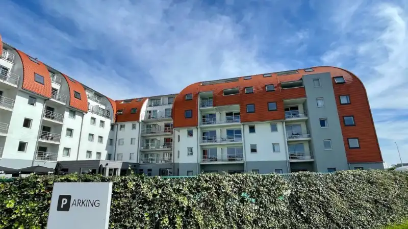 Familiesuite-appartement ( 2v + 3k ) te koop in Zeebrugge foto {{pictureIndex}}
