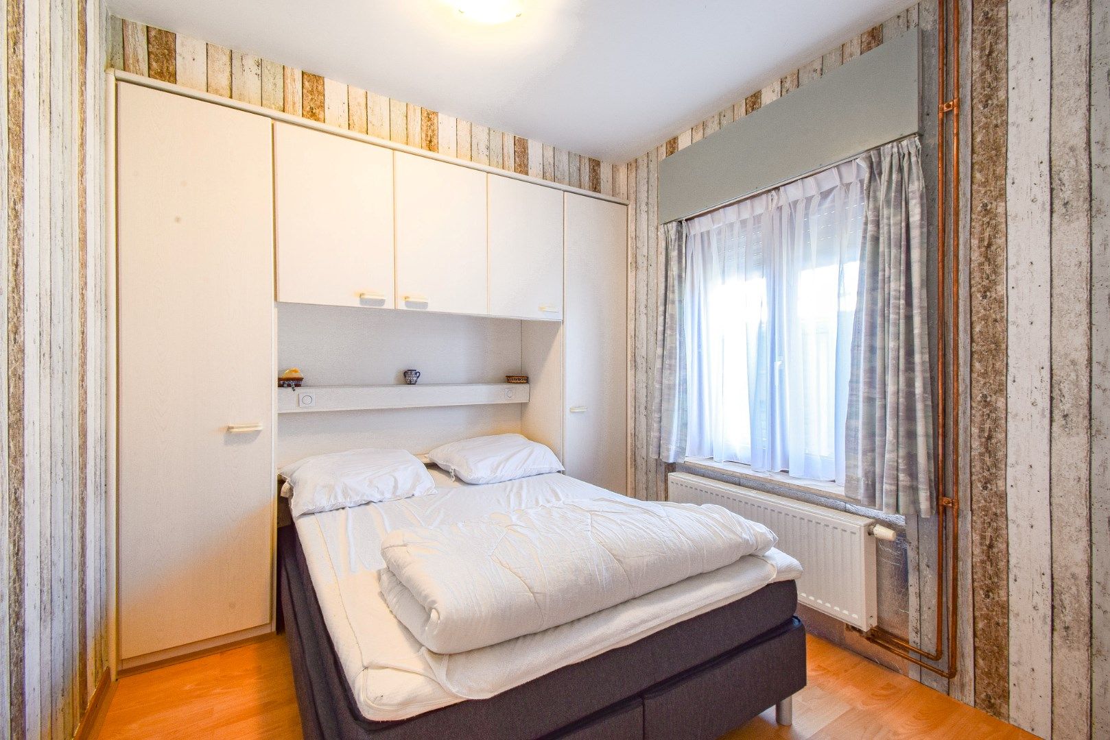 Gezellige vakantiewoning met twee slaapkamers en prachtige tuin in het Kristinapark foto 9